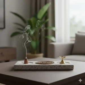 A contemporary, stone-look incense burner holder suitable for burning both cones and coil incense.