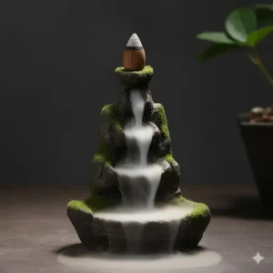 Close-up of a stunning ceramic waterfall setup with backflow smoke, demonstrating beautiful incense cones and holders in use.