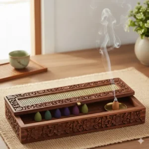 A carved wooden box designed for safely burning inside, making it an ideal choice for decorative incense cones and holders.