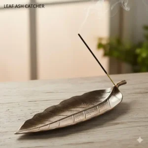 A long, leaf-shaped metal incense stick holder designed as an ash catcher to keep surfaces clean while burning incense.