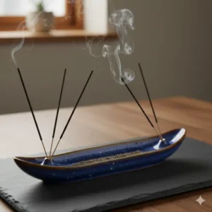 A long, boat-shaped ceramic dish that serves as an effective ash catcher and scent stick holder for long-burning Japanese incense.