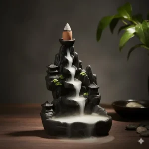 Decorative ceramic incense holder for backflow cones showing smoke cascading like a waterfall.